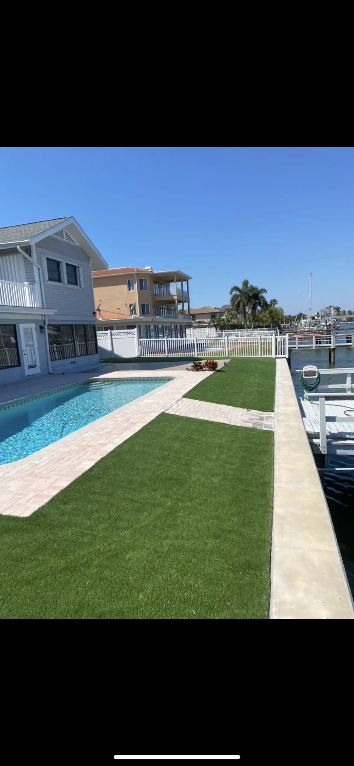 Completed landscaping project with fresh sod installation in St. Petersburg